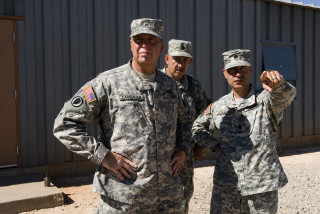 Military uniforms two men boys - a picture together in front free wallpaper