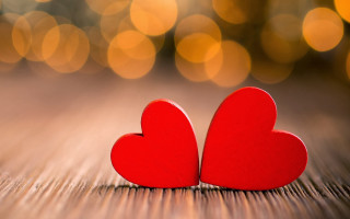 Red hearts wooden table blurry 2 - two red heart free wallpaper