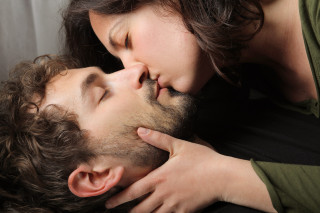 Woman kissing man eyes closed - his chest free wallpaper
