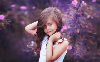 Young girl purple background flowers 3 - a young girl free wallpaper for desktop