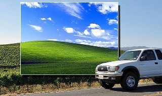 White truck driving green field - a white truck free wallpaper