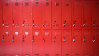 Red lockers different locks red - a red wall behind them free wallpaper