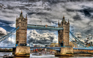 Gothic bridge tower sunset cityscape - the background and a boat free wallpaper for desktop