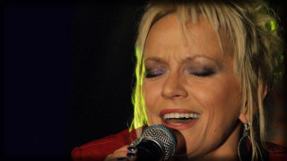 Woman microphone green light hair - anita kunz free wallpaper