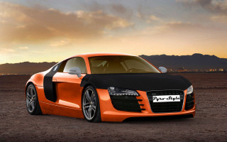 Orange black car desert mountains - a desert area free wallpaper