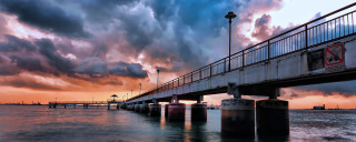 Bridge over water sky clouds - colorful cloud free wallpaper