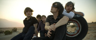 Young men desert tire sunset - young man free wallpaper