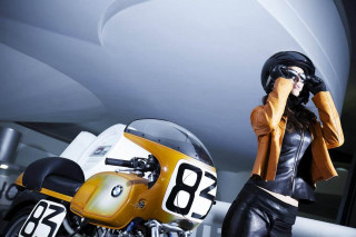 Woman leather motorcycle helmet standing - a helmet free wallpaper
