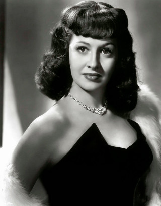 Woman black dress fur stole - free retro wallpaper for mobile