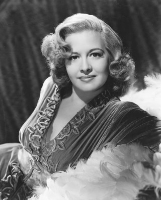 Woman dress feathers smile happy - head and shoulders portrait free wallpaper for mobile