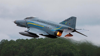 Fighter jet cloudy sky forest 4 - a yellow light free wallpaper