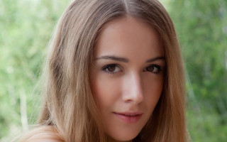 Eszter blonde hair green background - style free wallpaper