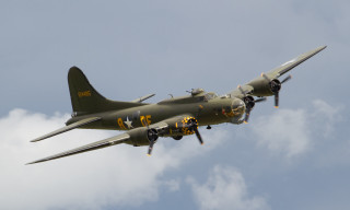 Military plane flying cloudy sky 3 - a large military plane free wallpaper