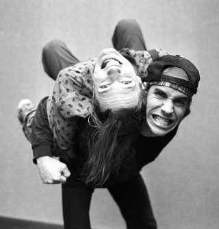 Man holding woman upside down - complex free wallpaper for tablet