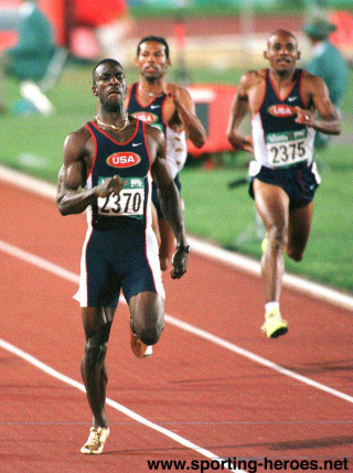 Men running track stadium spectators 4 - free vintage wallpaper