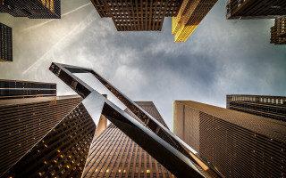 City skyscrapers plane sky view - a view of a city free wallpaper