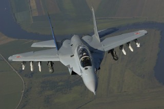 Fighter jet lush green field 2 - viennese actionism free wallpaper