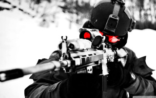 Man black jacket gun aiming - a black jacket holding free wallpaper