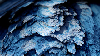 Blue black textured material closeup - material free wallpaper