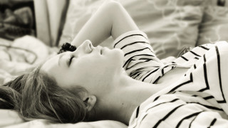 Woman laying bed eyes closed 3 - photo free wallpaper