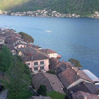 Town water boat mountain view - free landscape wallpaper for tablet