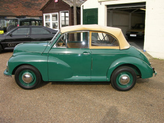 Green car garage tan roof - a garage door free wallpaper