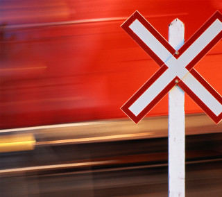 Railroad crossing sign train background - objective abstraction free wallpaper for tablet