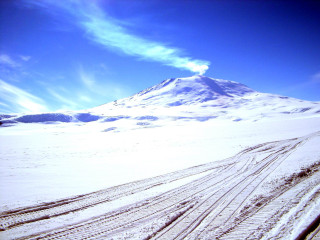 Snow covered mountain tracks blue - track free wallpaper