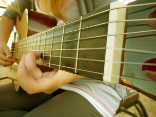 Person playing guitar hands strings 4 - shallow free wallpaper for desktop