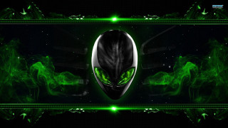 Green alien black face glowing - a green alien free wallpaper