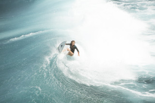 Man riding wave surfboard ocean 38 - kodachrome free wallpaper