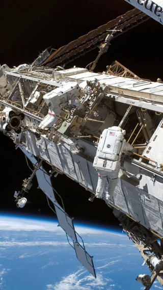 Space station satellite earth background - free space wallpaper for mobile