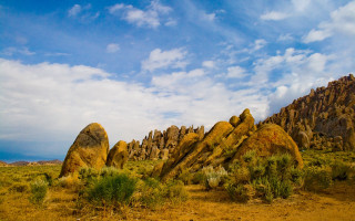 Large rock formation desert sky 2 - ambrose mccarthy patterson free wallpaper