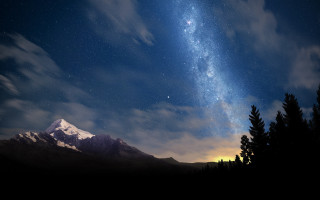 Night sky mountain trees bright - a bright star in the background free wallpaper