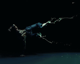 Man handstand dark legs spread - a handstand free wallpaper