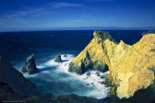 Rocky cliff water background sticking - a rocky cliff free wallpaper