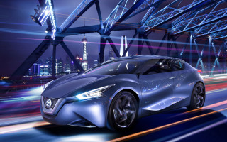 Futuristic car night city skyline - a futuristic car free wallpaper for desktop