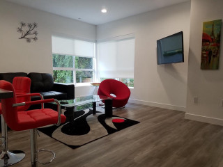 Living room tv red chair - a red chair free wallpaper