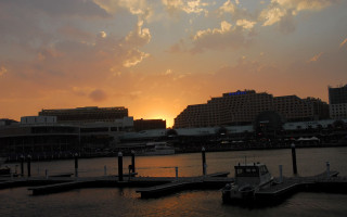 Sunset city boats docked buildings - elizabeth durack free wallpaper