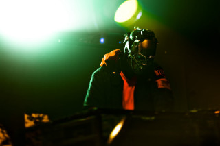 Man dark room green light - cyberpunk art free wallpaper for desktop