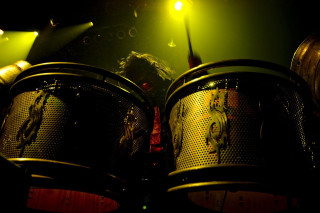 Man playing drums dark room - neodada free wallpaper