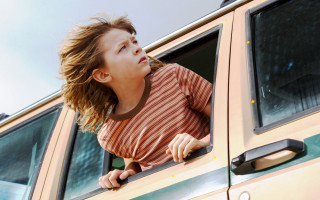 Young girl car window hair - a young girl free wallpaper