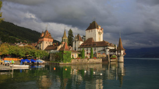 Castle lake boats cloudy sky - a few building free wallpaper