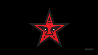 Red star face black background - a red star free wallpaper