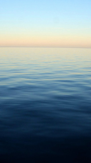 Large body of water sky 5 - a boat free wallpaper for mobile