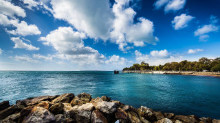 Water rocks pier cloudy sky - elizabeth durack free wallpaper