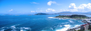 Beach water view hill town - panoramic free wallpaper