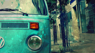 Blue van parked street building - free retro wallpaper