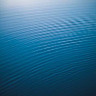 Water boat distant blue sky - a body of water free wallpaper for tablet