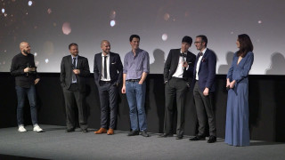 Group people stage projector man - a man in a suit and tie free wallpaper